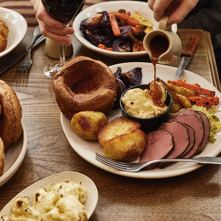 Cover Image for Sunday roasts with all the trimmings at The King’s Arms in Prestbury, Cheltenham.